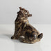 Knud Kyhn for Royal Copenhagen, Denmark, stoneware figure of a dog with Sung glaze M5722