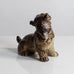 Knud Kyhn for Royal Copenhagen, Denmark, stoneware figure of a dog with Sung glaze M5722