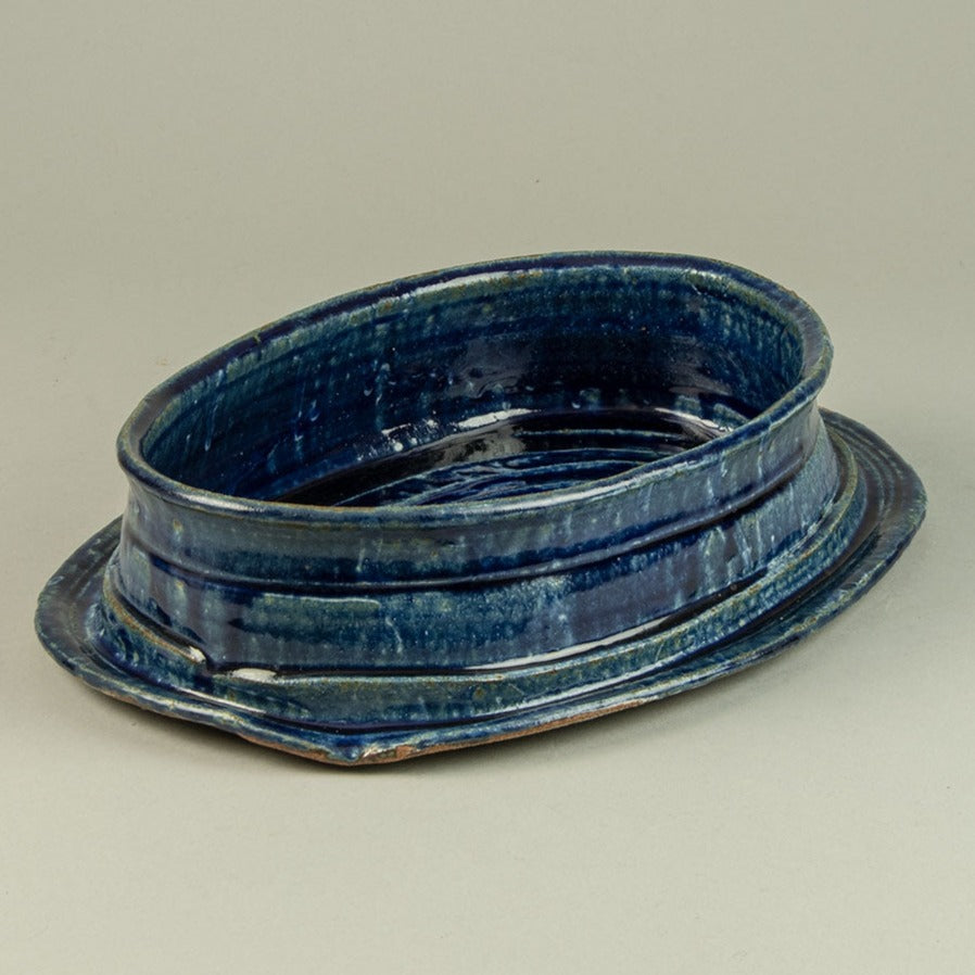 Betty Woodman, US unique stoneware bowl with glossy blue glaze H1247