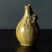 Arne Bang, own studio, Denmark  Stoneware vase with applied twig decorations, and brown and yellow ochre glaze, 1930s-1940s.