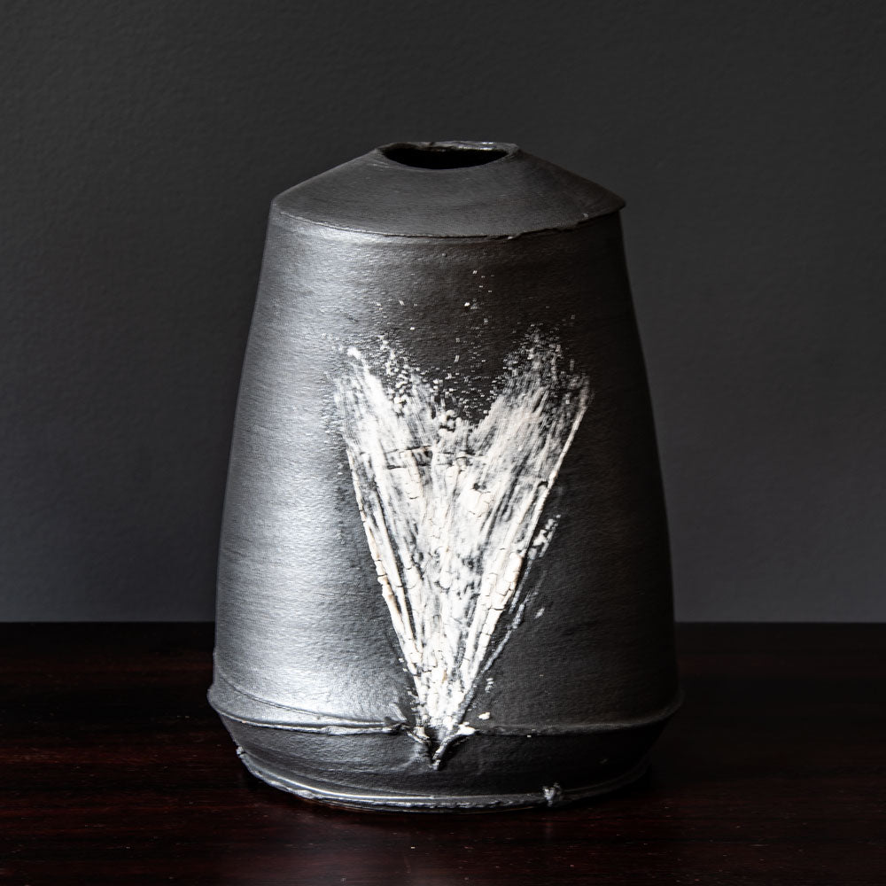 Dan Kelly, UK, stoneware pot with matte black glaze and white streak H1205